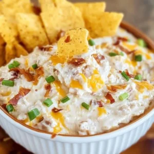 Delicious Million Dollar Crack Dip served in a bowl with tortilla chips