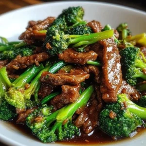 Delicious plate of Chinese beef and broccoli served with rice.