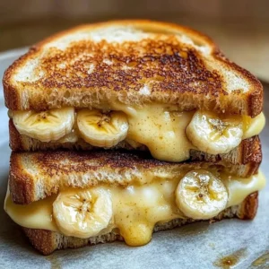 Honey banana grilled cheese sandwich with melted cheese and banana slices