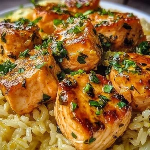 Mediterranean salmon served with lemon rice on a plate