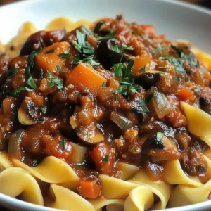 Bowl of delicious Mushroom Ragu garnished with herbs