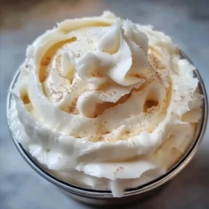 Delicious Chantilly frosting on a layered cake