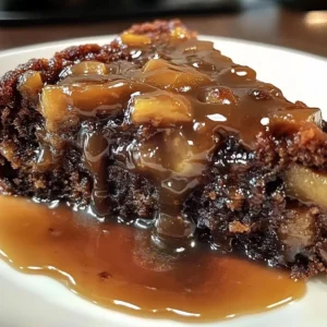 Warm apple date treacle cake drizzled with buttery sauce