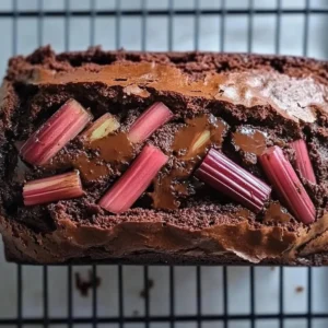 Loaf of Chocolate Rhubarb Bread with chocolate chunks and rhubarb pieces