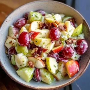 Fresh Apple Grape Salad with sliced apples and grapes in a bowl